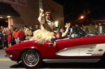 Miss North Carolina Laura Matrazzo rides in a vintage Corvette provided by Wayne Thomas Chevrolet in the 2018 Asheboro Christmas Parade. (The North State Journal)