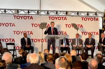 Gov. Roy Cooper, flanked by other state leaders, speaks at the announcement event for Toyota Motor North America bringing 1,750 jobs to Randolph County (PJ Ward-Brown|The North State Journal)