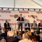 Gov. Roy Cooper, flanked by other state leaders, speaks at the announcement event for Toyota Motor North America bringing 1,750 jobs to Randolph County (PJ Ward-Brown|The North State Journal)