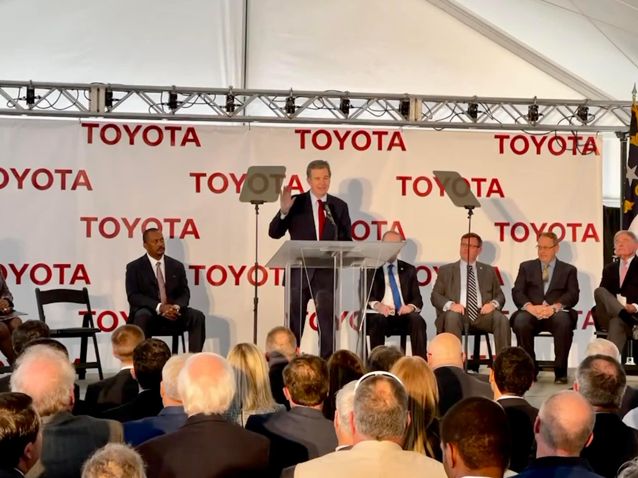 Gov. Roy Cooper, flanked by other state leaders, speaks at the announcement event for Toyota Motor North America bringing 1,750 jobs to Randolph County (PJ Ward-Brown|The North State Journal)
