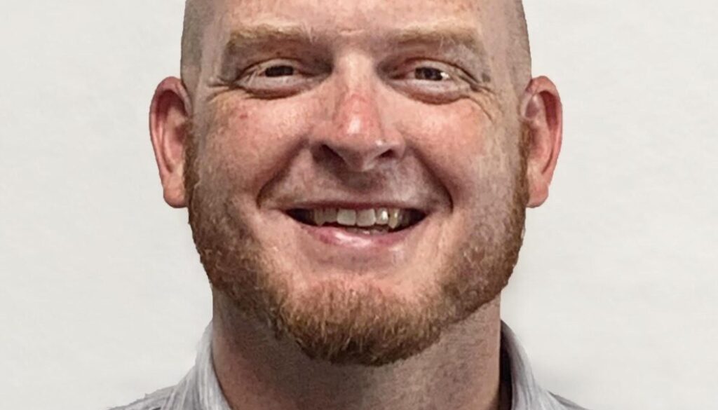 David Hayes headshot new PG football coach