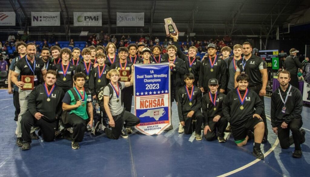 UCA wrestling team photo after winning 2023 state duals