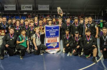 UCA wrestling team photo after winning 2023 state duals