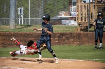 ER baseball K Graham makes tag v N Moore April2023