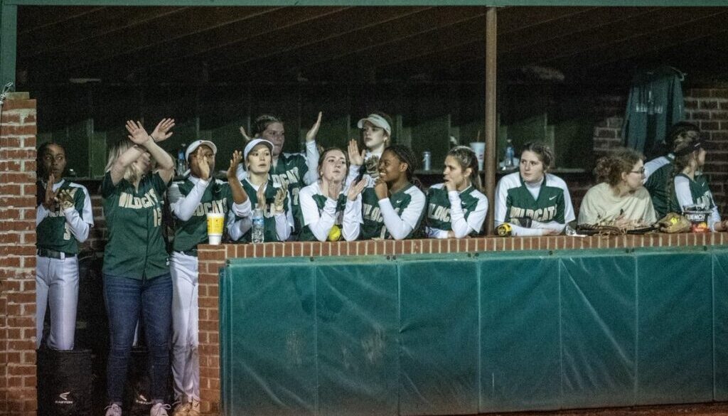 ER softball team in dugout spring2023