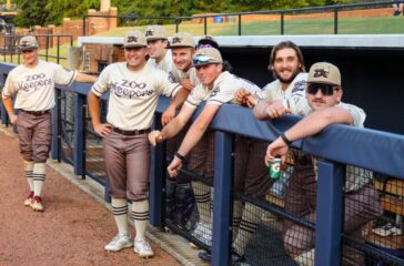 ZooKeepers front of dugout at UNCG June 9 2023