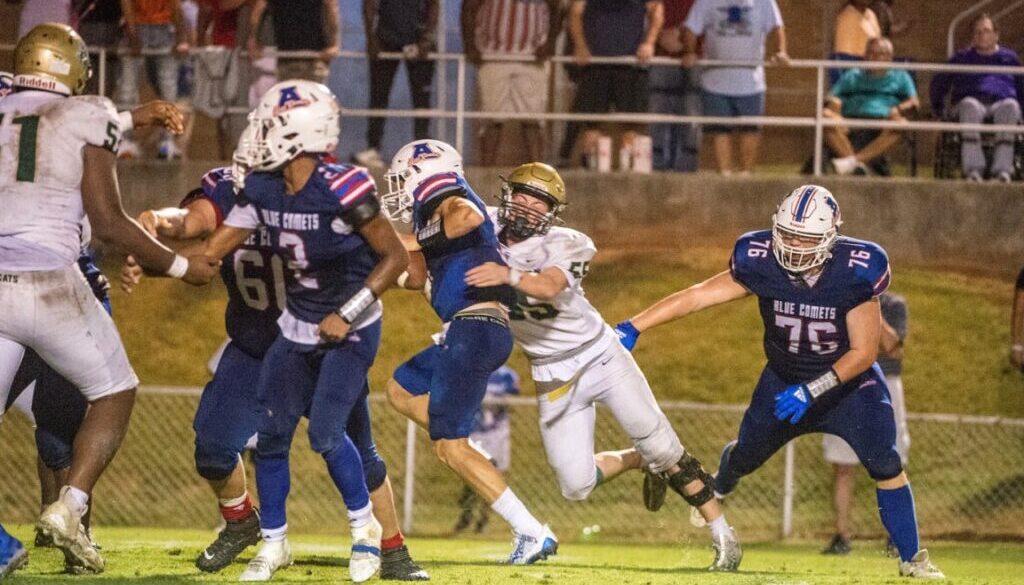 ER football Will Stalker tackles Asheboro WR Ben Luck Aug2023