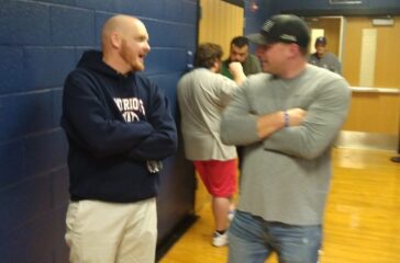 PG football coach David Hayes and former coach Calvin Brown
