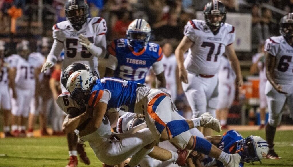 Randleman football Thomas Dobias sacks James Ellis of PG