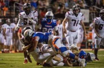 Randleman football Thomas Dobias sacks James Ellis of PG