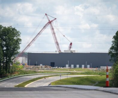 Interstate 685 announcement Toyota plant in background