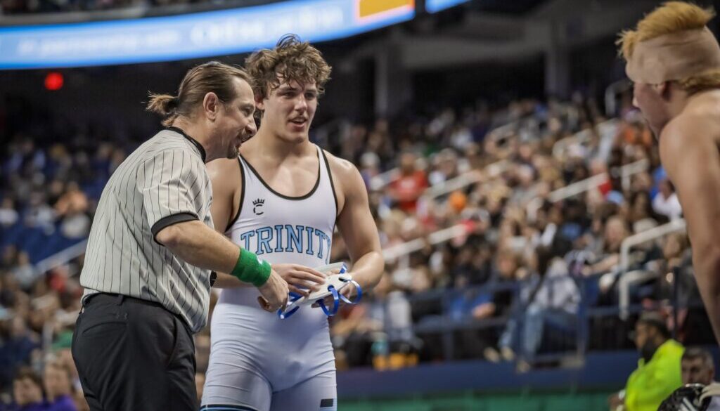 Trinity wrestling Gavin Hardister at end of title bout2024