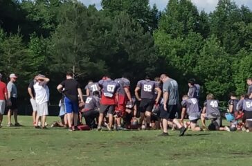 Wheatmore football postpractice huddle May2024