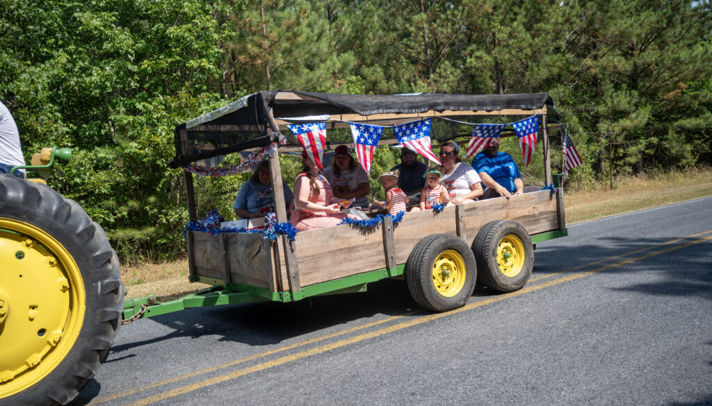 Millboro parade in cart behind tractor 2024