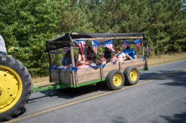 Millboro parade in cart behind tractor 2024