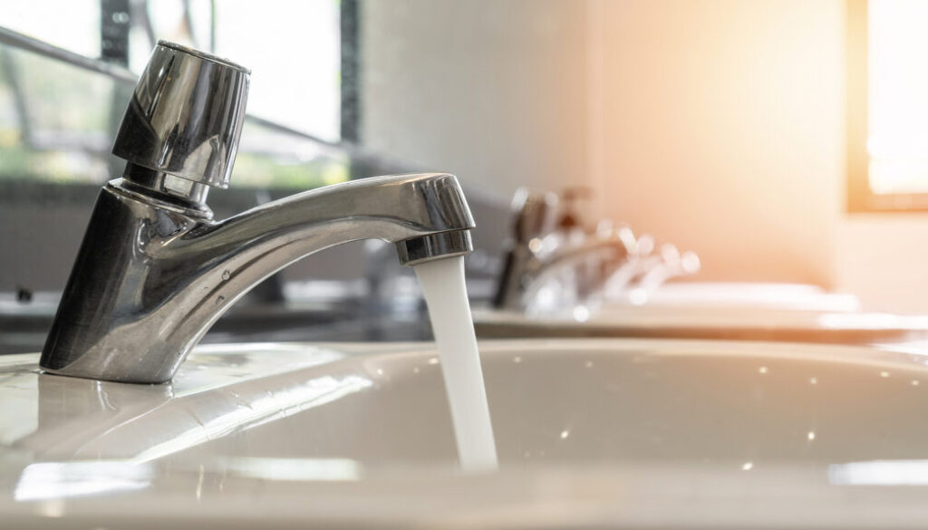 Tap Water Running Wastage From Faucet Over Hand Washing Sink, Ce