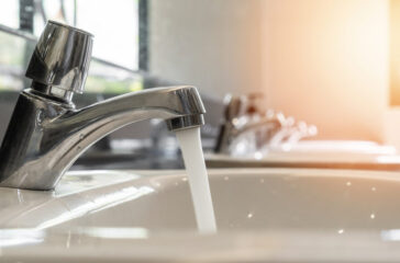 Tap Water Running Wastage From Faucet Over Hand Washing Sink, Ce