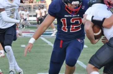 PG football Brady Collins about to make tackle