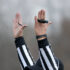 American football referee signals a touchdown.