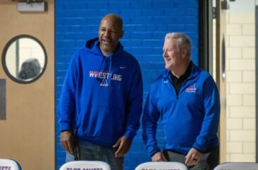 Asheboro wrestling coach Cliff Thompson with man Jan2025