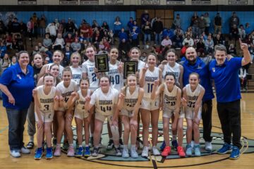 Winning smiles: Middle school basketball champions