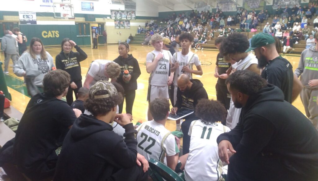 ER boys basketball bench huddle Feb 10 2025