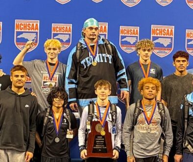 Trinity wrestling team group photo after 2026 individual states